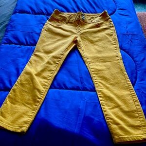 Yellow/Gold Jeans.  Size 6.  3 buttons in front with zipper.